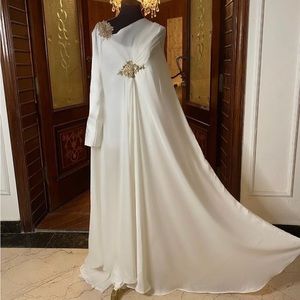 Pure silk kaftan dress in white,embellished with pearls and fancy embroidery